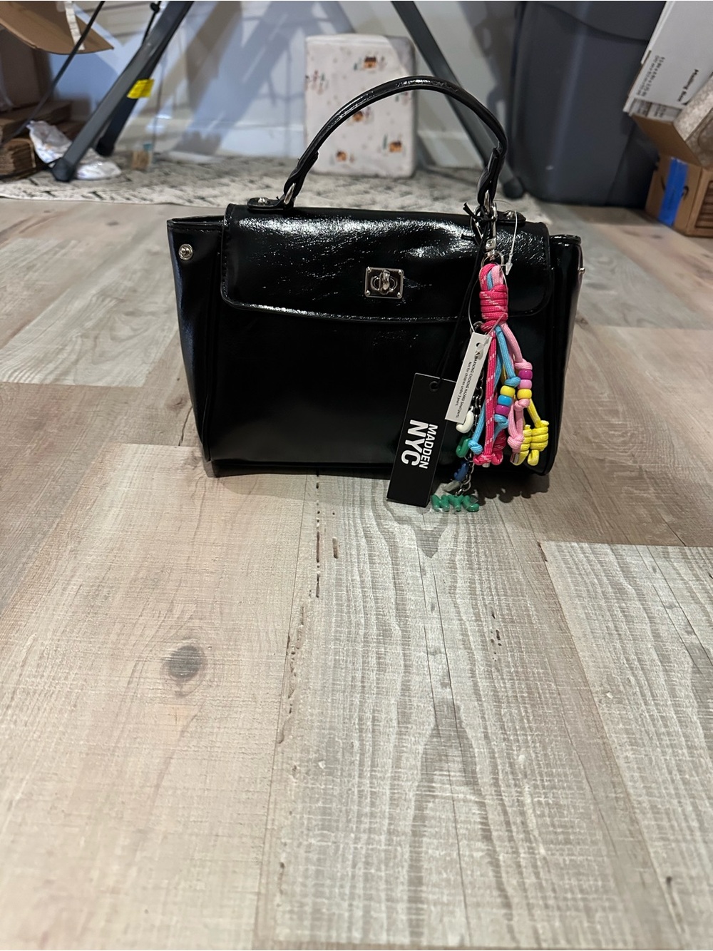 Glossy Black Mini Top-Handle Bag with Colorful Charm